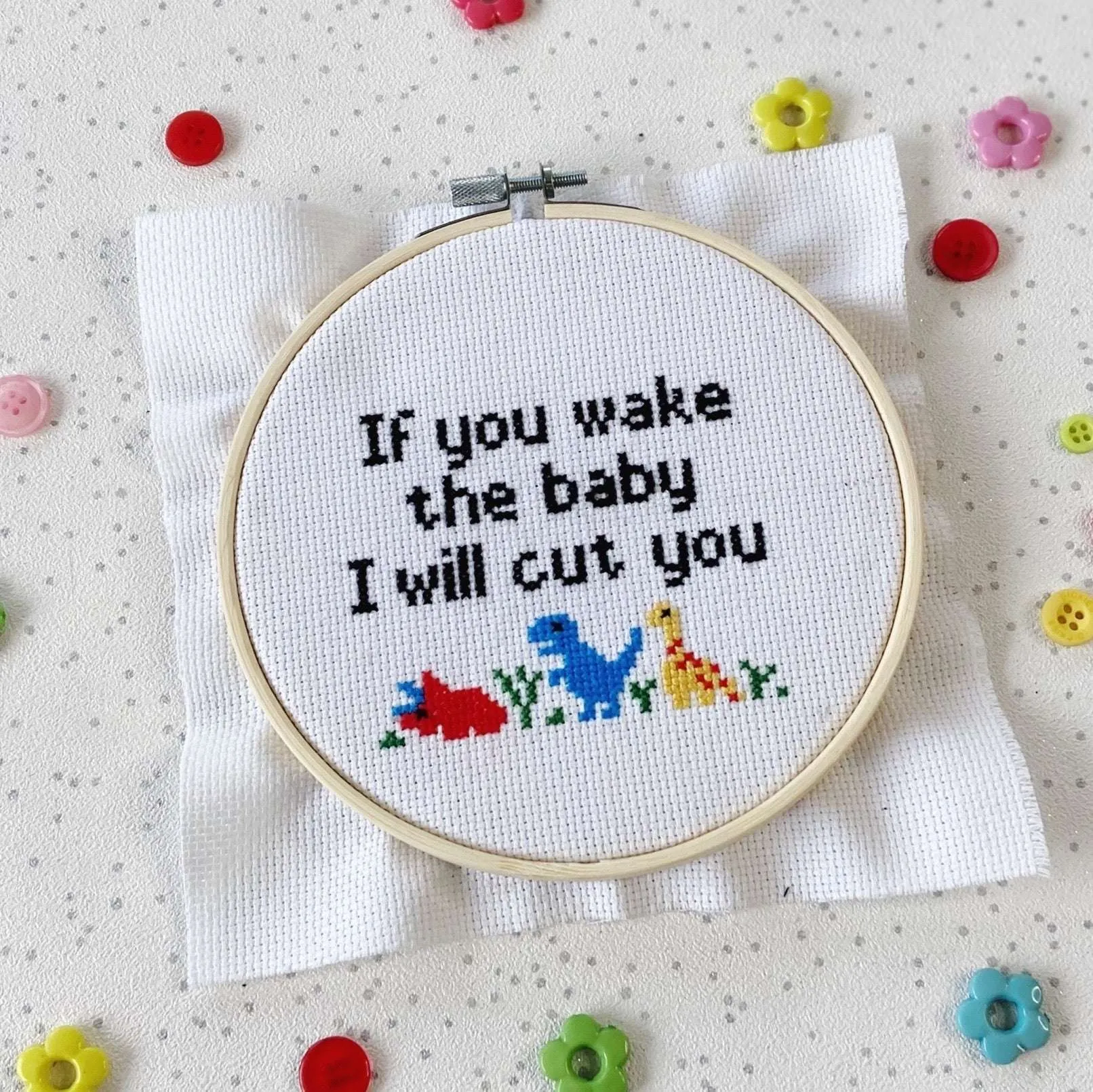 Baby cross stitch with dinosaurs