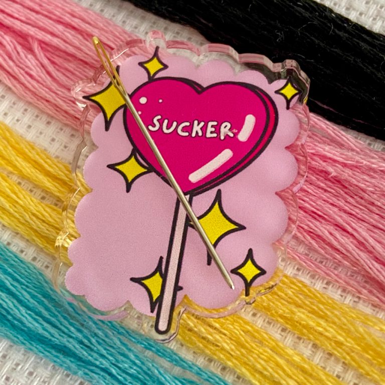 Sucker needle minder